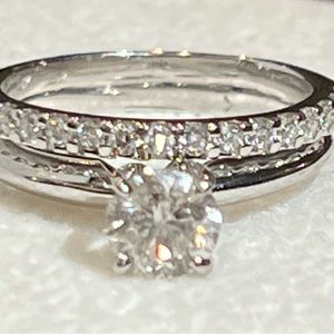 14kt white gold solitaire engagement ring & wedding band set. Appraised at $2587